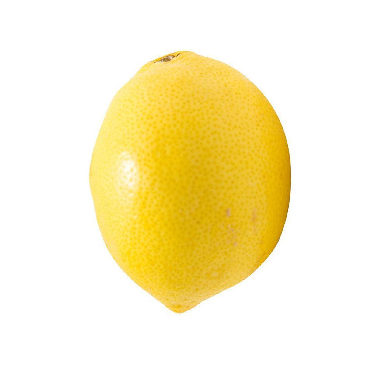 Organic Mexican lemon, bright yellow oblong fruit with textured skin