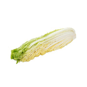 Quarter-cut Japanese Chinese cabbage with pale sliced layers and green outer leaves