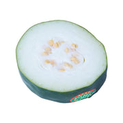 Japanese winter melon half with pale green flesh and seed-filled center