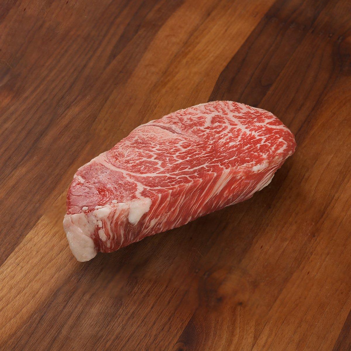 Chilled prime beef tenderloin, raw marbled red steak cut
