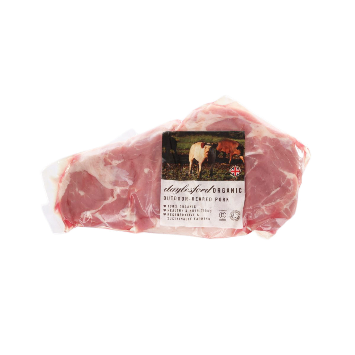 Vacuum-sealed chilled pork collar with green label, marbled pink-and-white meat