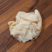 Frozen beef omasum tripe, pale white chopped pieces