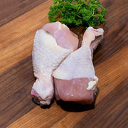 Chilled chicken drumsticks with skin and bone, raw