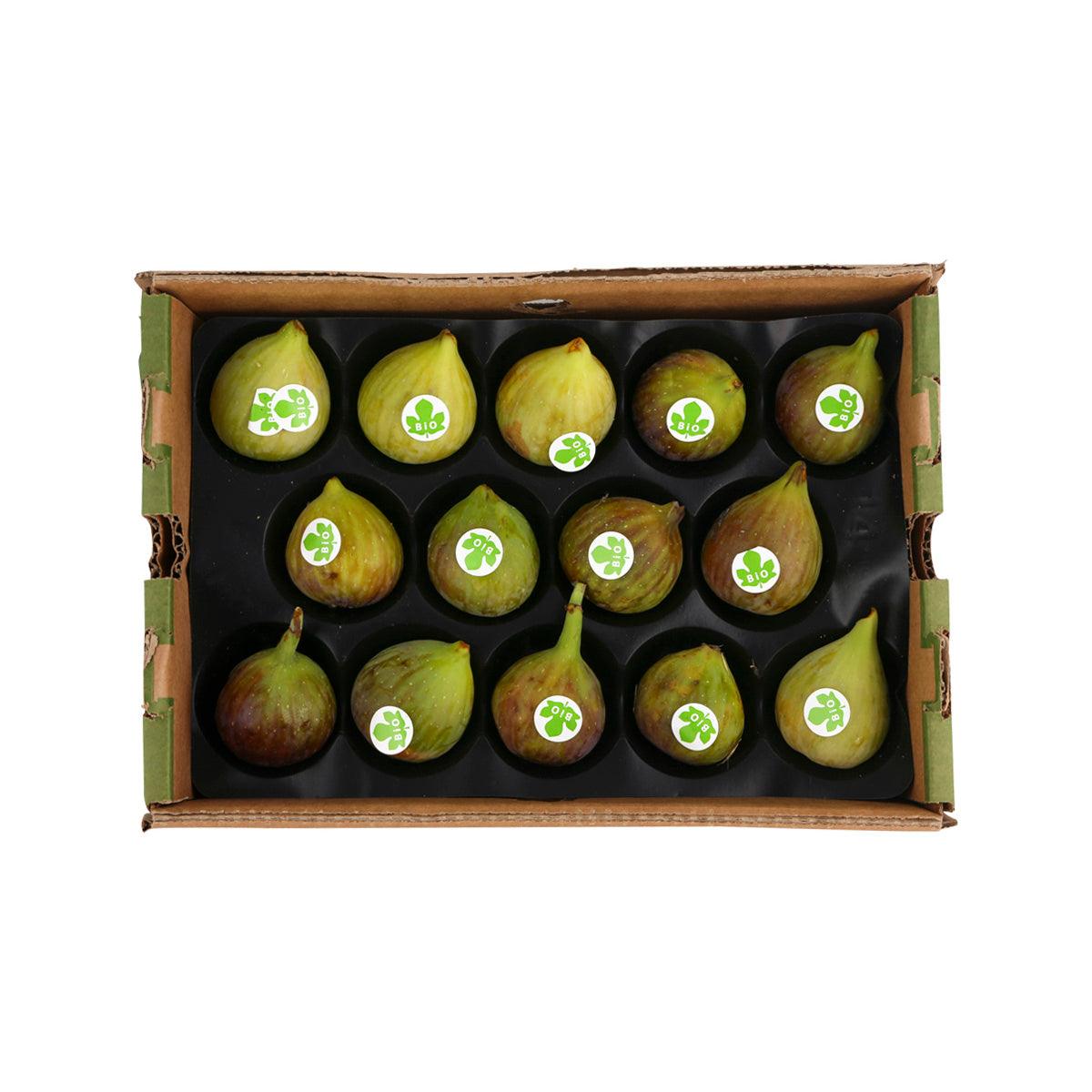 Organic green fig gift box with open cardboard tray of whole figs, green and yellow