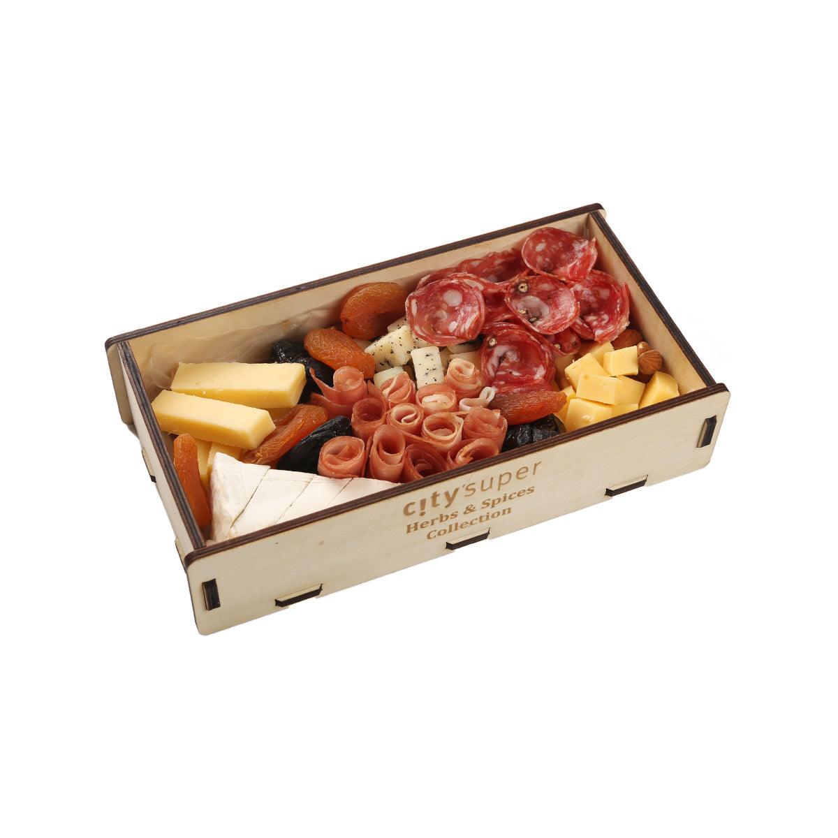 Eco-friendly gourmet platter crate with cheese cubes, salami slices, and sliced meats