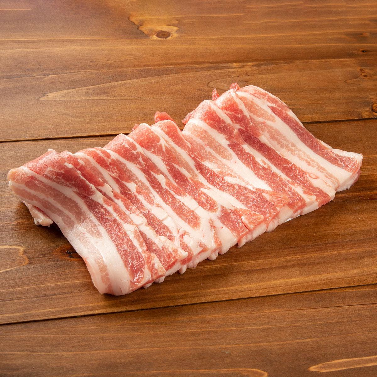 Sliced pork belly for yakiniku with marbled red and white stripes
