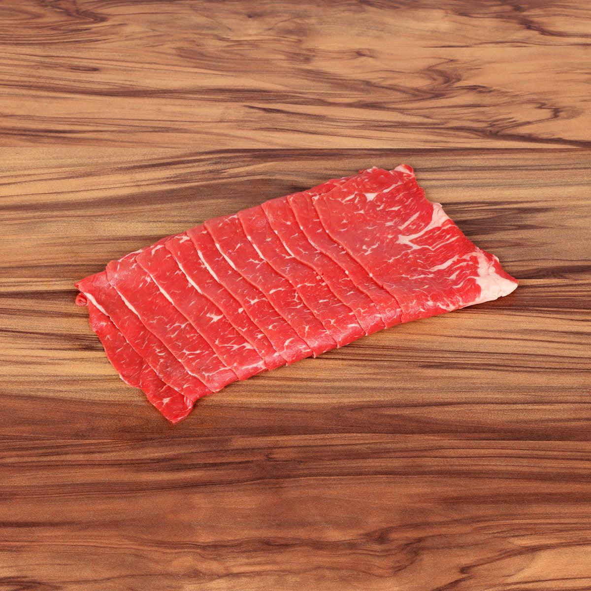 Sliced red beef shabu shabu meat, thin marbled strips