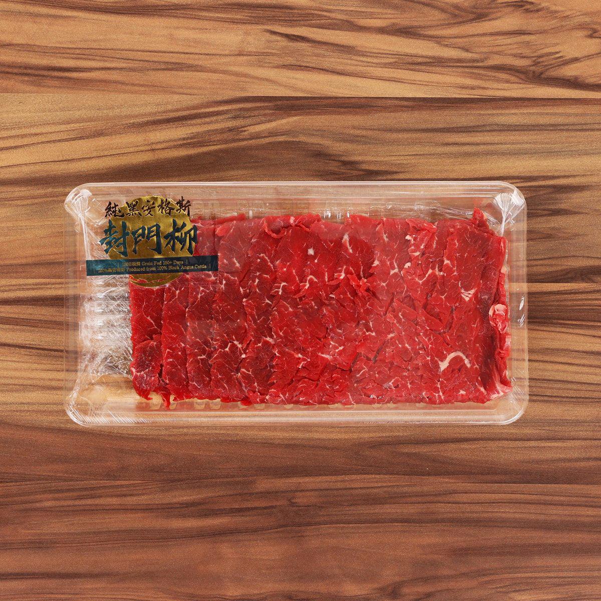 Vacuum-sealed red marbled hanger steak in a clear plastic tray