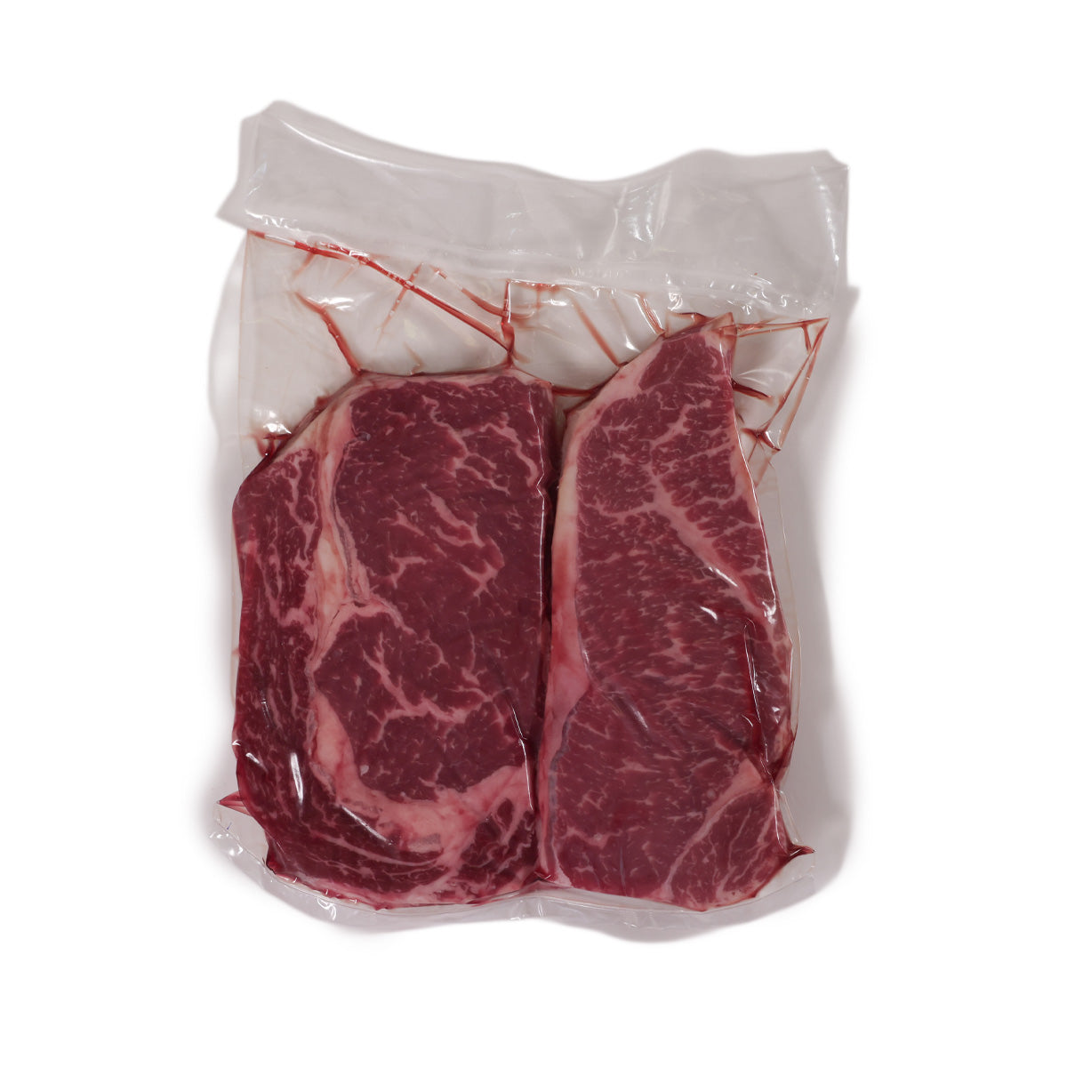 Prime Black Angus beef steak set in sealed bag: two marbled steaks