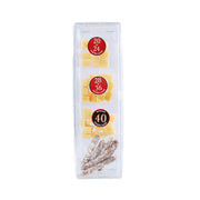 Cheese tasting set in clear plastic tray with cheese wedges and numbered labels