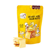 Yellow sugar butter crunchy rusk snack pouch with stacked square rusks
