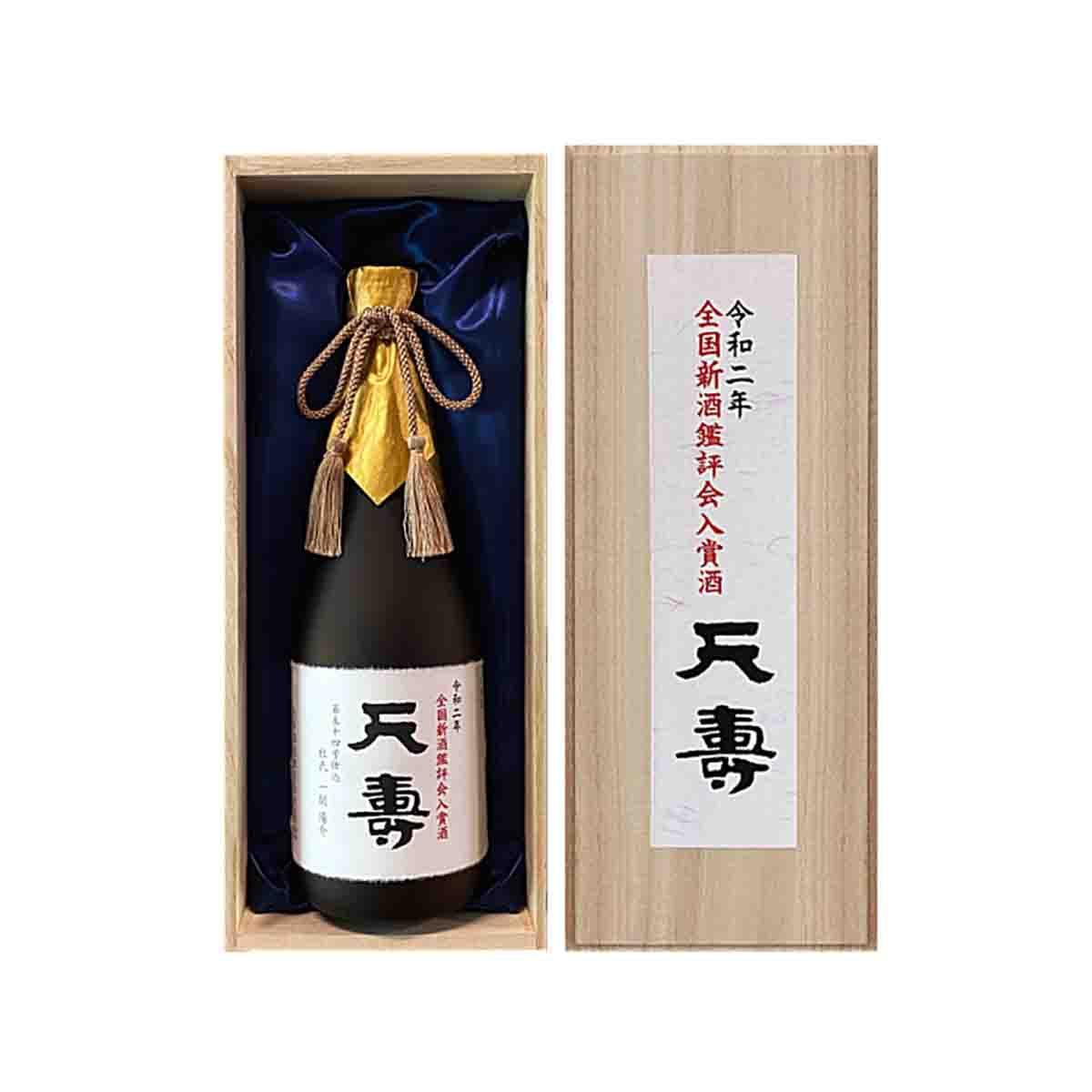Daiginjo sake bottle with gold award ribbon in wooden gift box