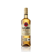 BACARDI Carta Oro rum bottle in amber glass with gold label