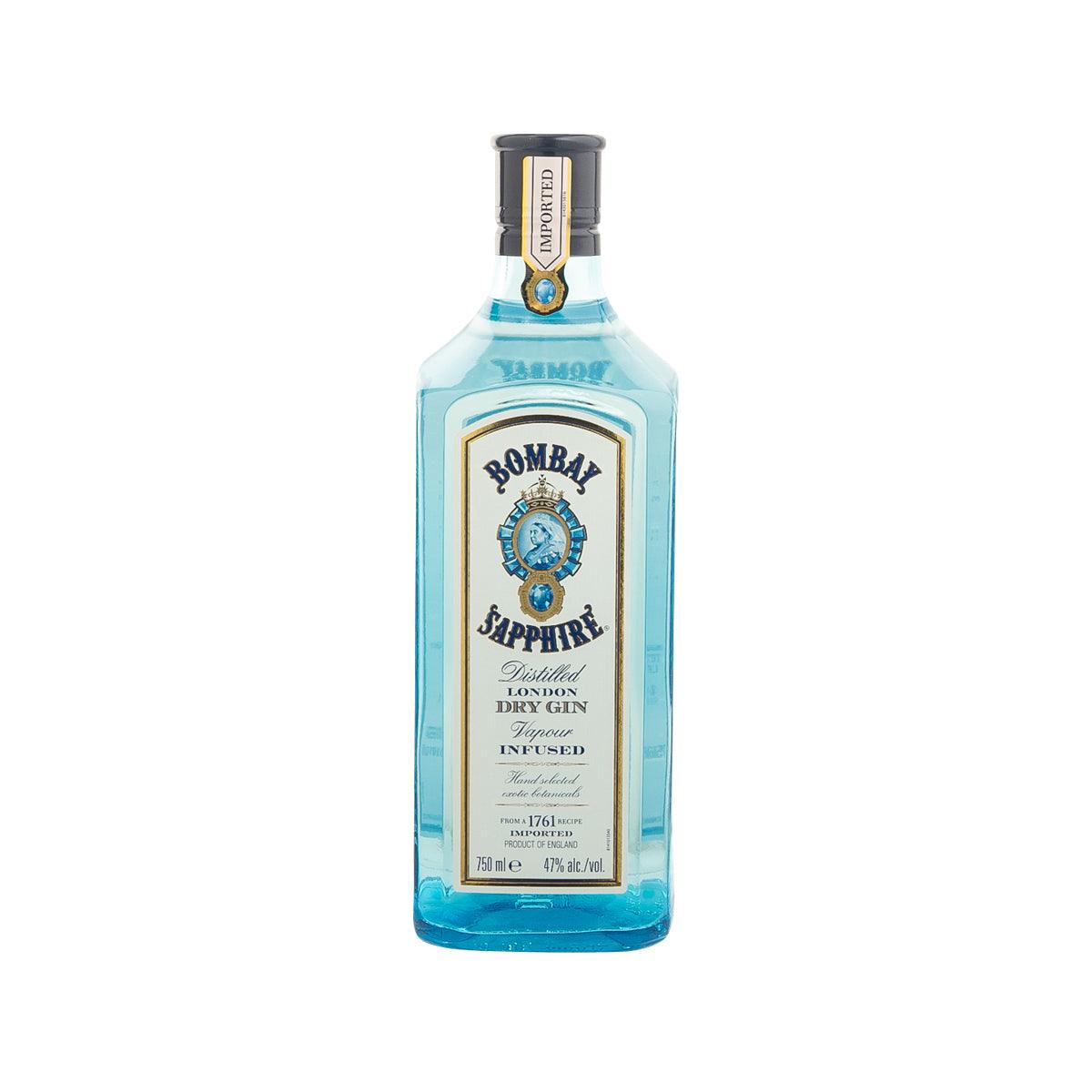 Bombay Sapphire dry gin bottle, clear blue glass with label and black cap