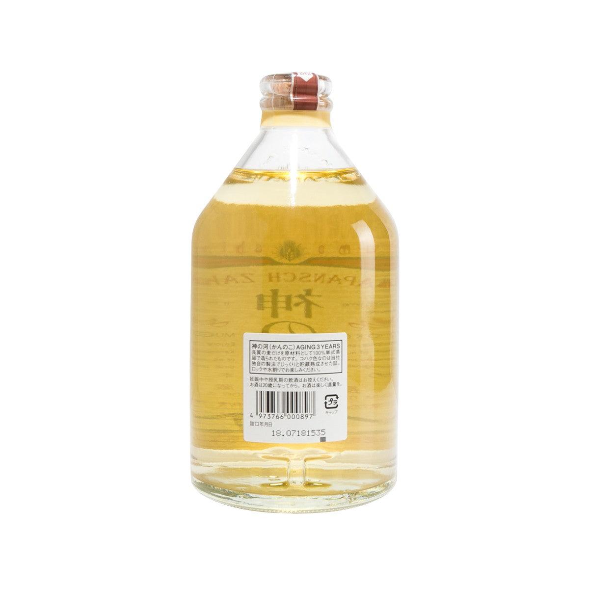 SATSUMA barley shochu bottle, back label with barcode on amber glass