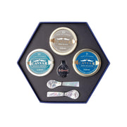 Caviar tasting set in hex gift box, featuring three caviar tins and serving spoons