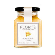 FLORTE Honey with Lemon jar (250g), amber honey in glass bottle with black lid