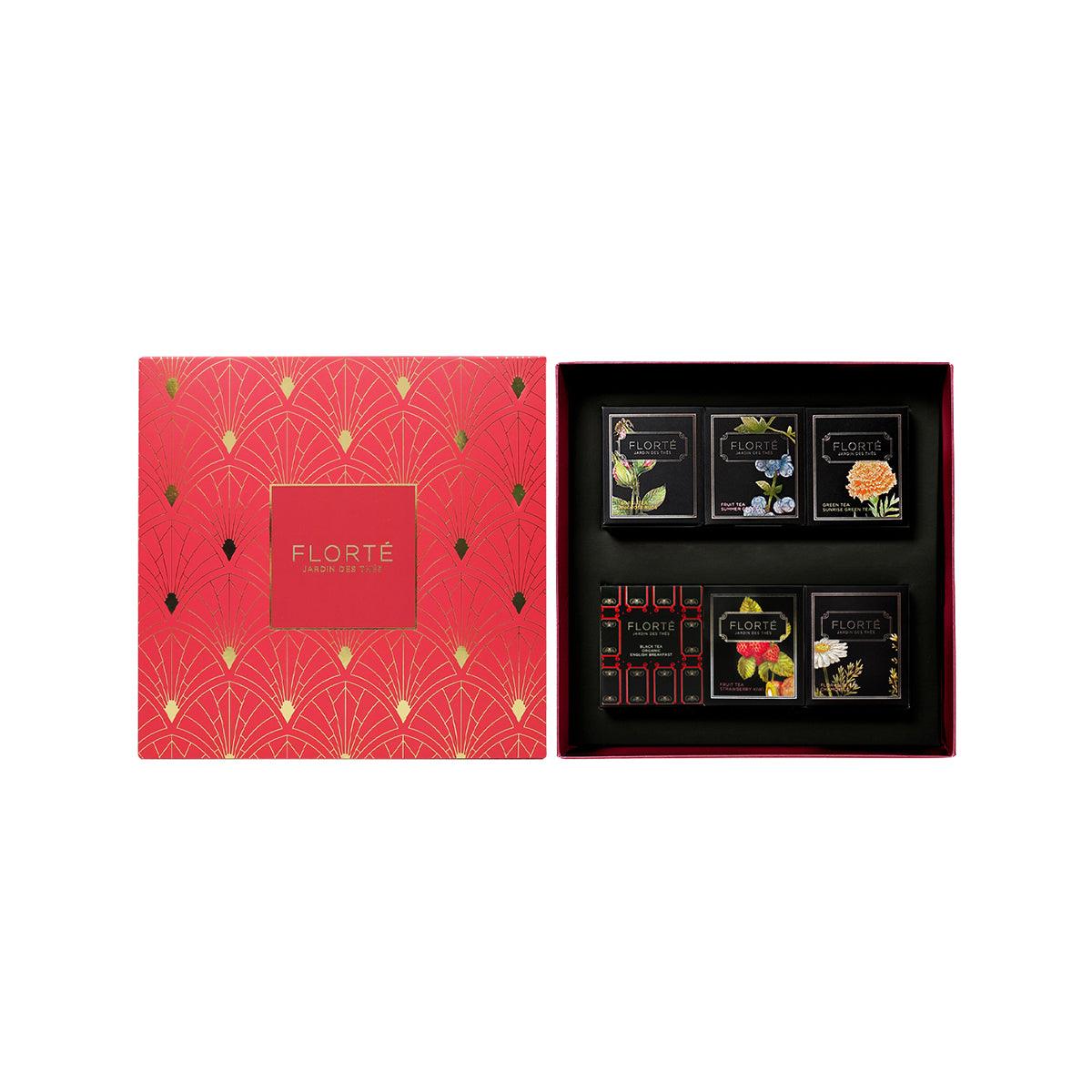 FLORTE loose tea gift set (6 pack) with six assorted tea tins in open box