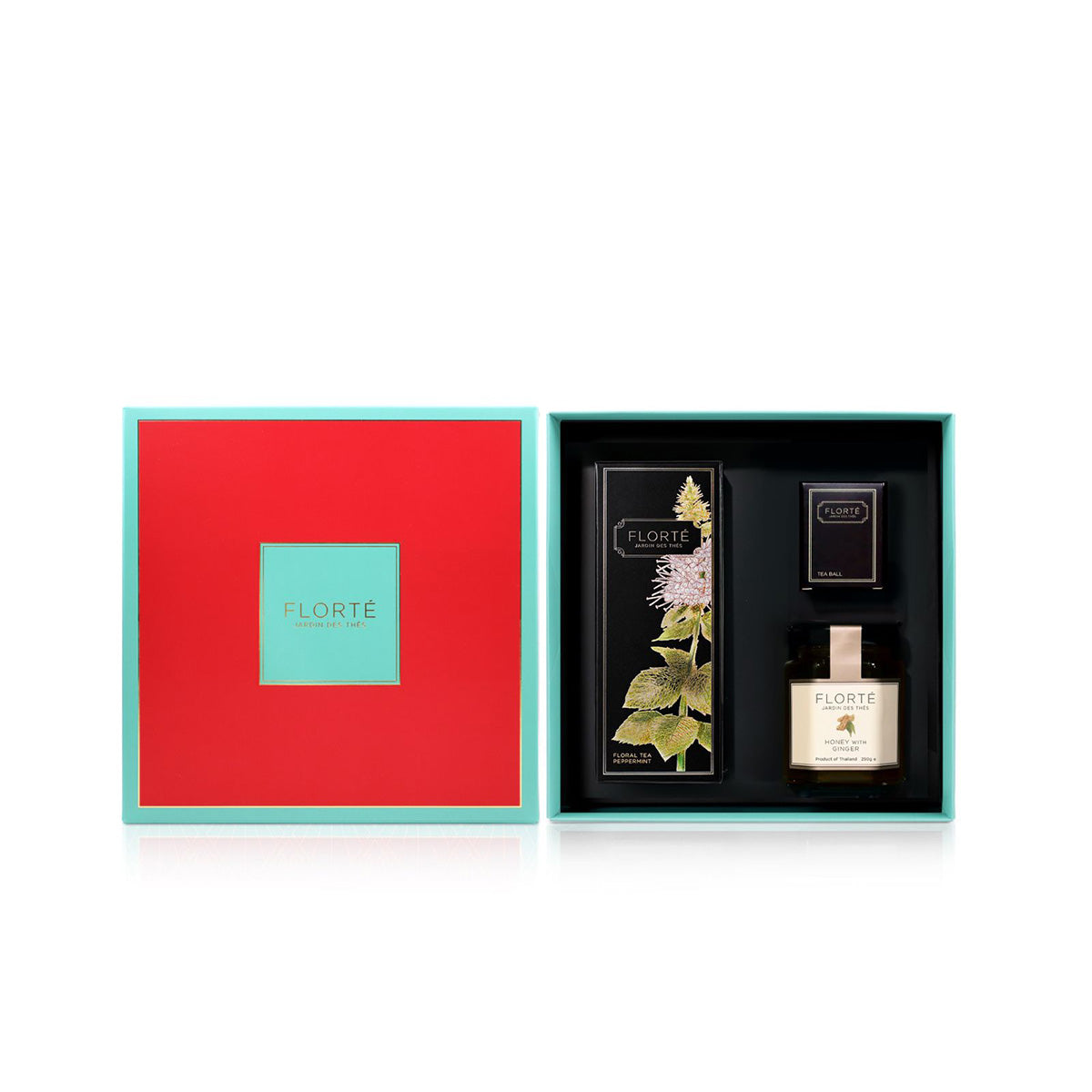 Tea gift set in two-piece boxes, inner tray with tea packs and honey bottle