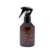 Brown spray mist bottle with black trigger nozzle for hair care, La Villa Vita label