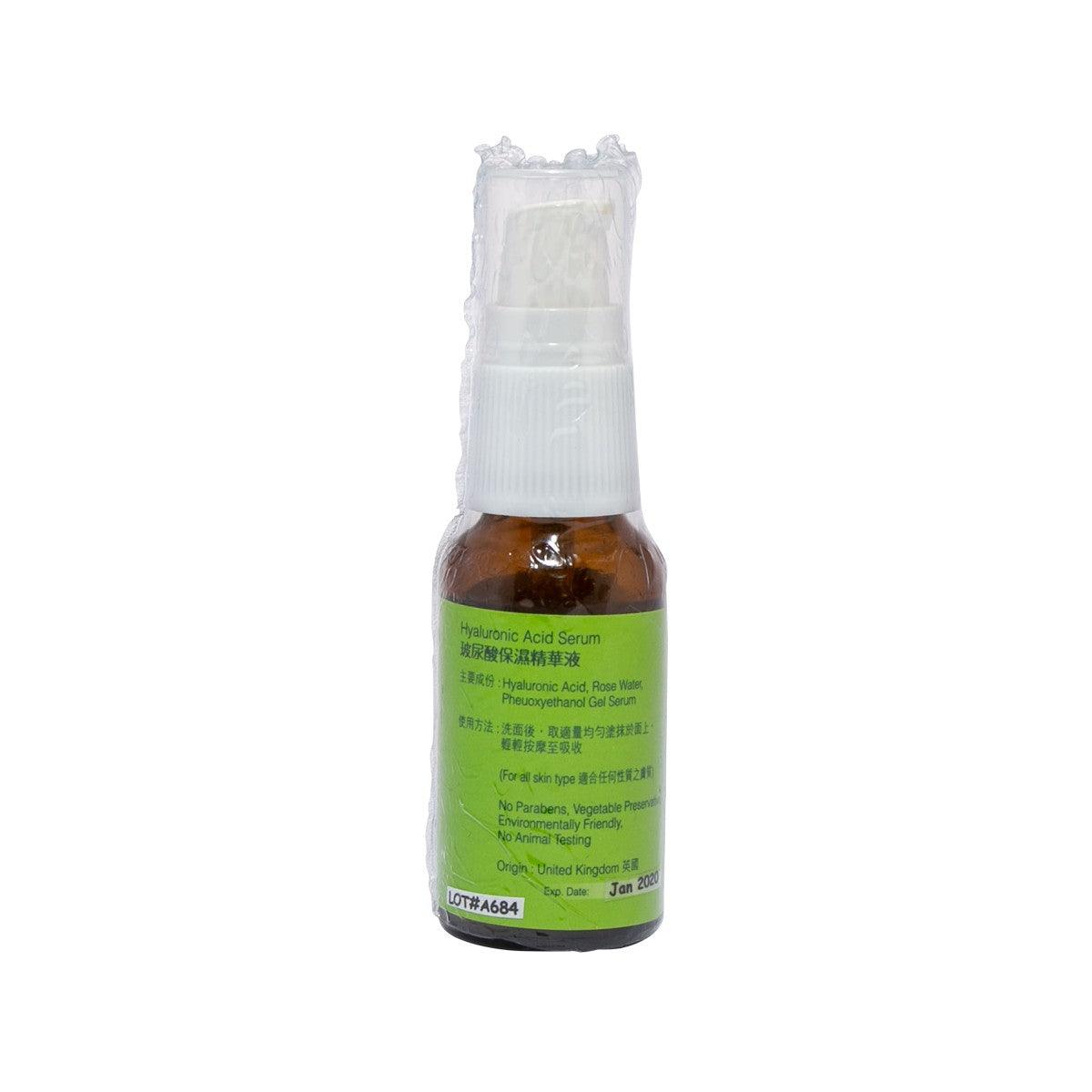 Amber serum bottle with white spray cap, green label, 20 mL