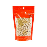 Hyacinth bean seeds 300 g bag, clear view of dried pale beans