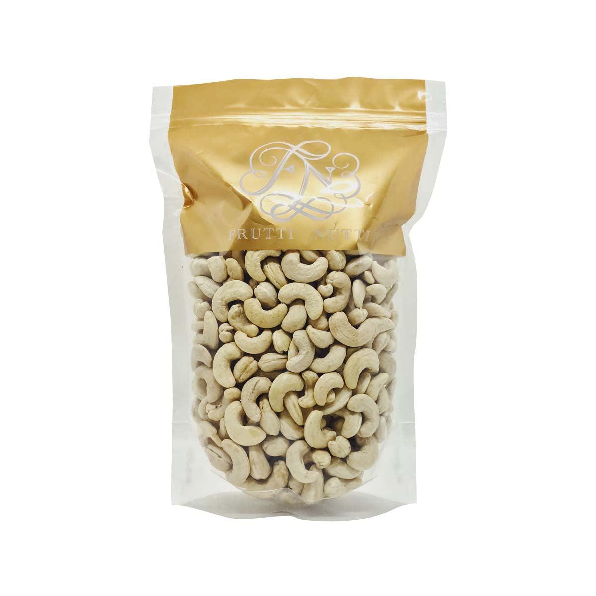 Cashews in a stand-up bag, white and beige nuts inside packaging