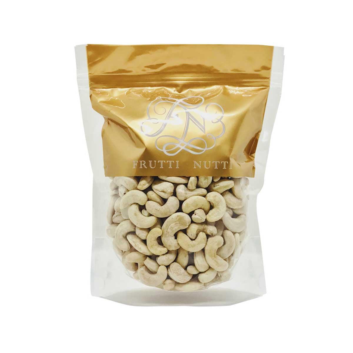 Cashews in gold-and-white stand-up pouch with whole nuts visible through the front