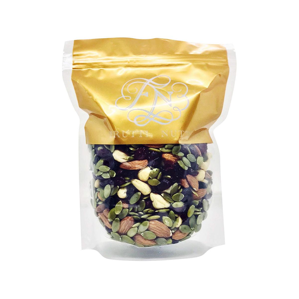 FRUTTI NUTTI power mix pouch with assorted nuts and seeds, gold top