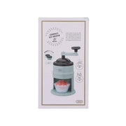 Compact ice shaver with pale aqua base and black hand crank, for countertop use