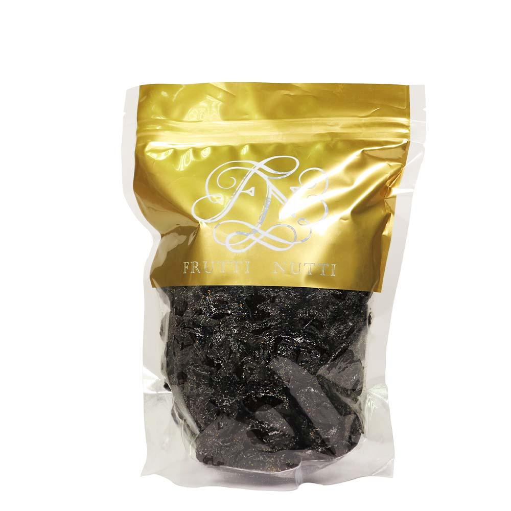 FRUTTI NUTTI prunes in a sealed gold and clear plastic bag