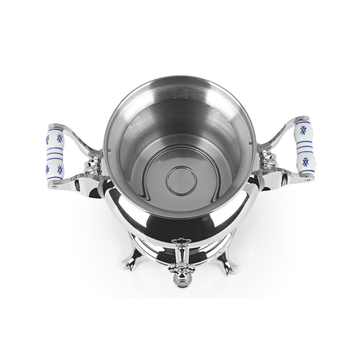 Stainless samovar top view with round lid, side handles with blue floral accents