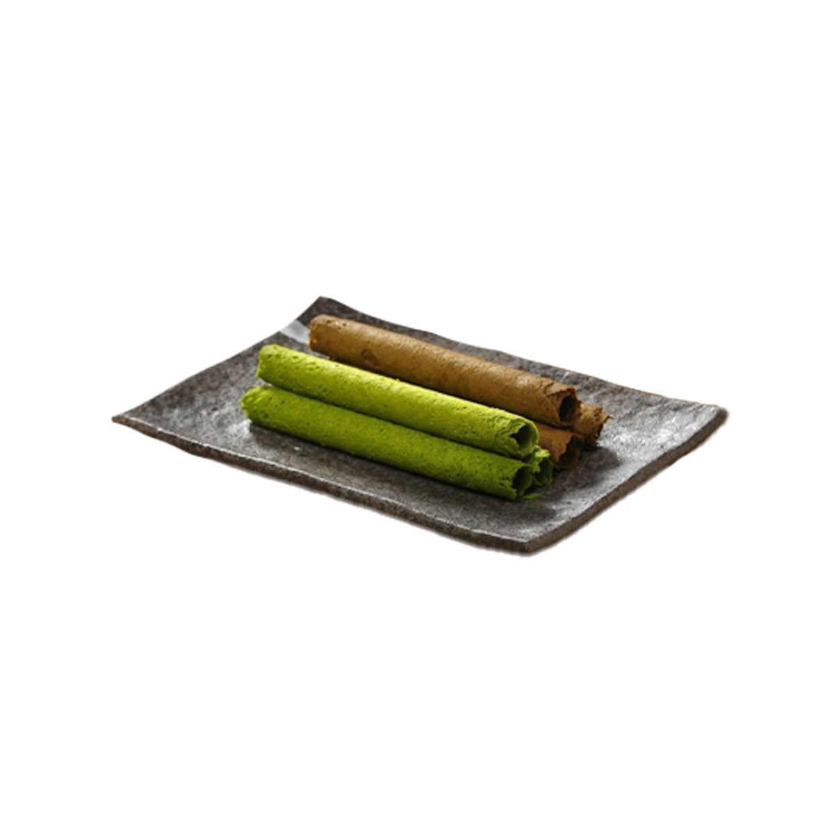 Matcha & Hojicha egg rolls on dark stone tray, green and tan rolls