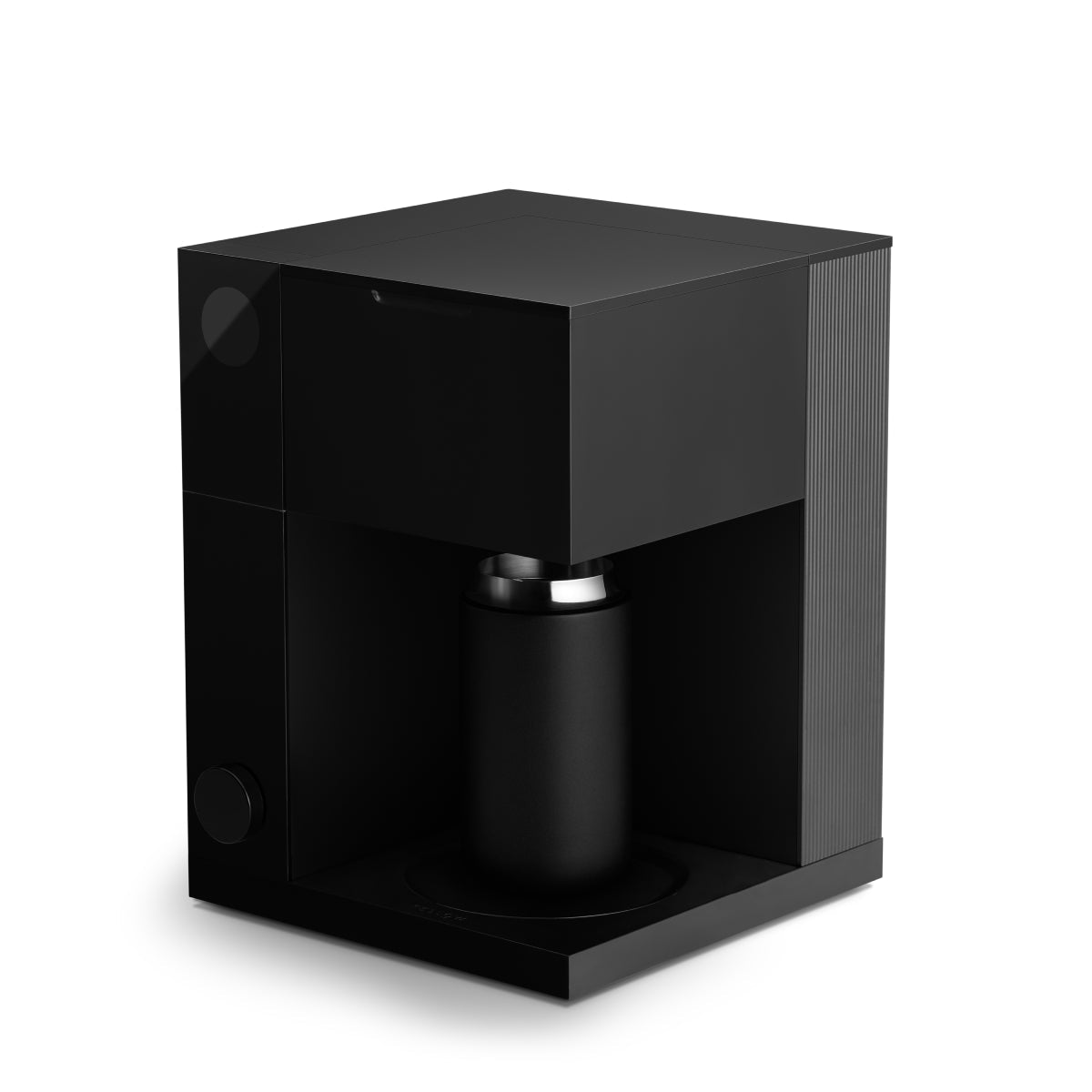 FELLOW Aiden matte black coffee maker showing carafe inside the chamber