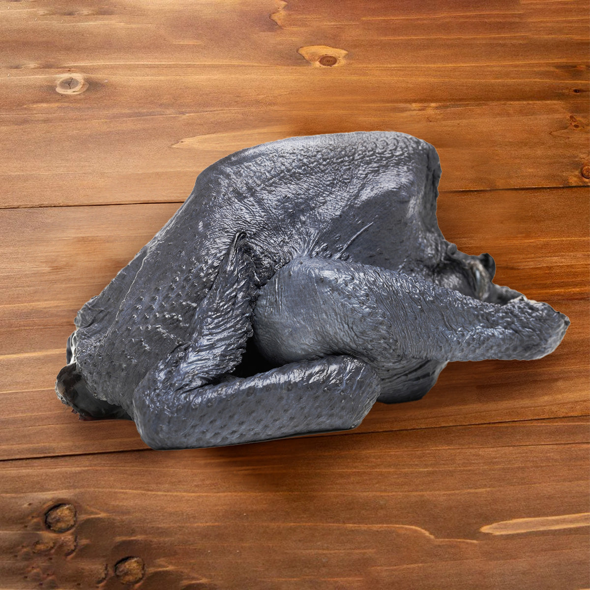 Chilled silkie chicken, dark gray whole bird
