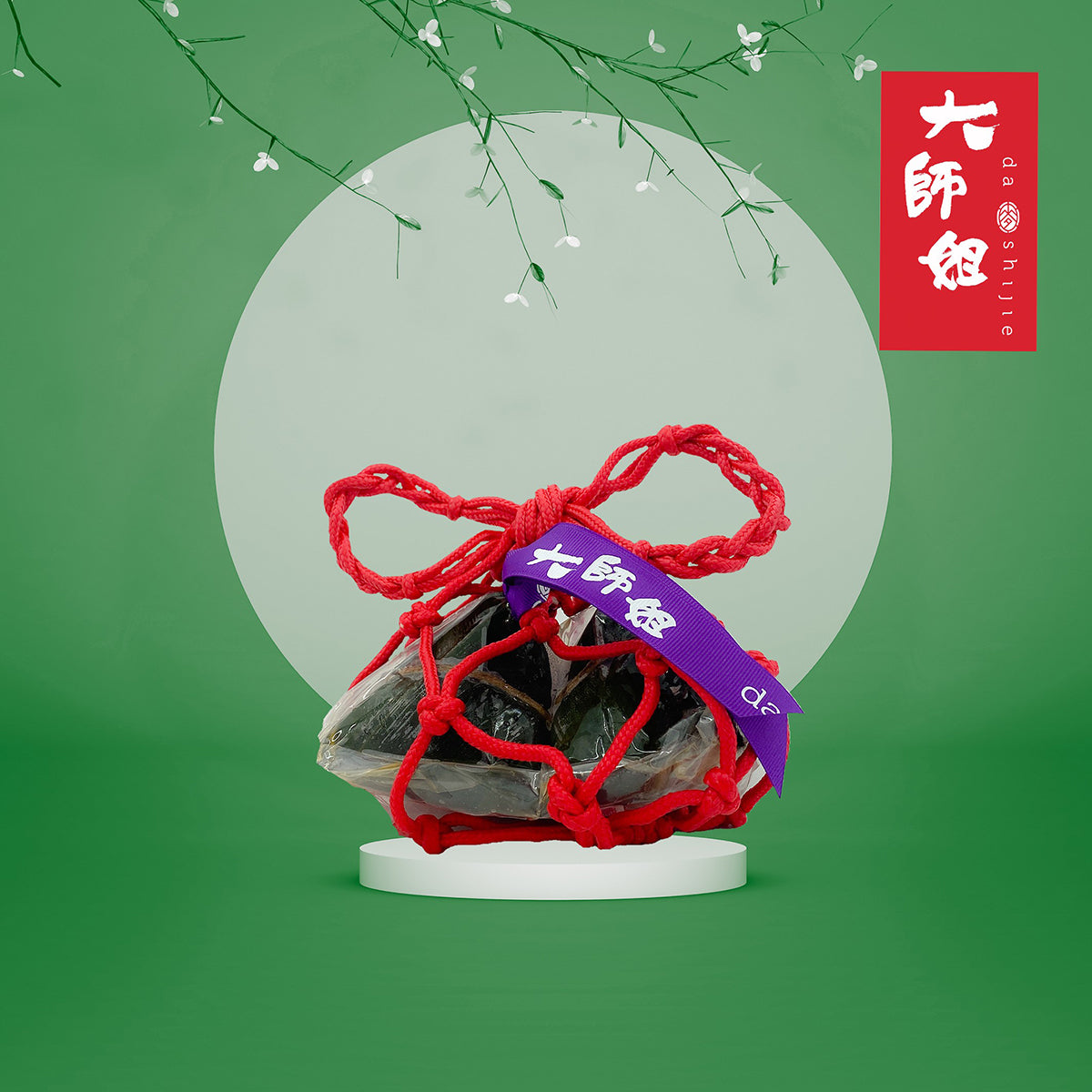 Keto dumpling bundle in clear pouch with red tie and ribbon on stand