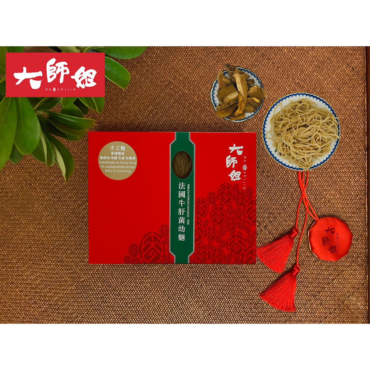 Porcini fine noodles 6-pack in red and green box with dried mushrooms and noodle bowl