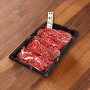 Raw chuck flap beef slices in a black hot pot meat tray, 1 pack