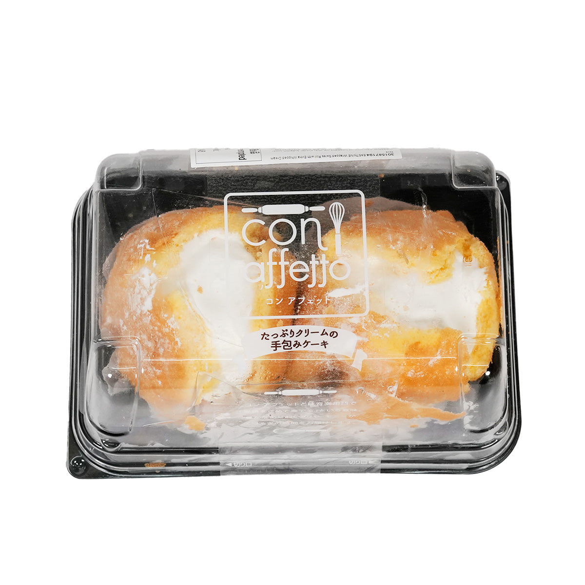 Packaged swiss roll dessert with extra whipped cream, in clear plastic tray