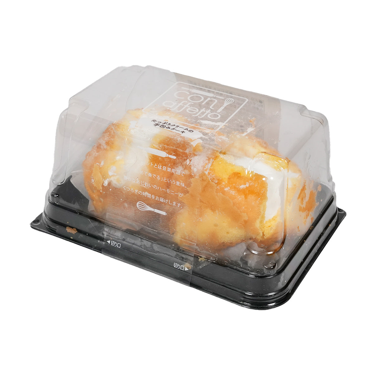 Packaged swiss roll dessert with creamy filling, clear lid on black base tray