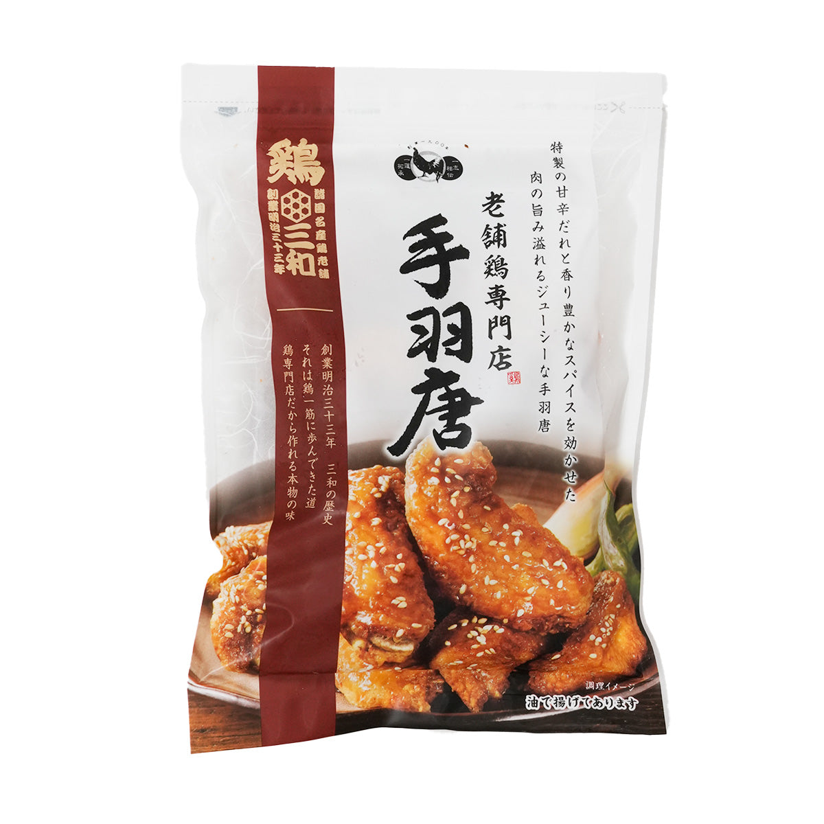 Frozen fried chicken wings in pouch with sesame-crusted wing pieces visible