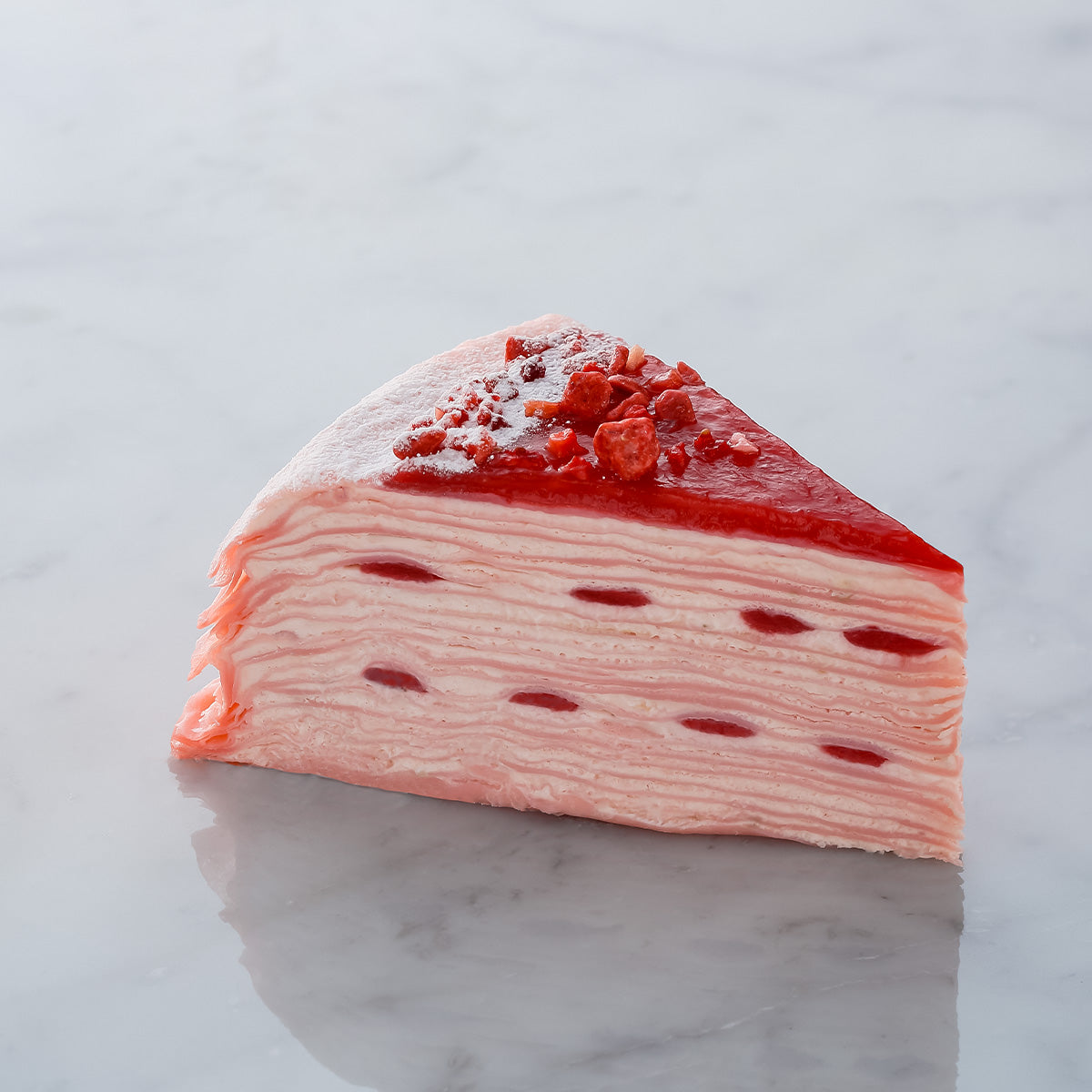 SUZETTE strawberry mille-crepe cake slice with strawberry topping
