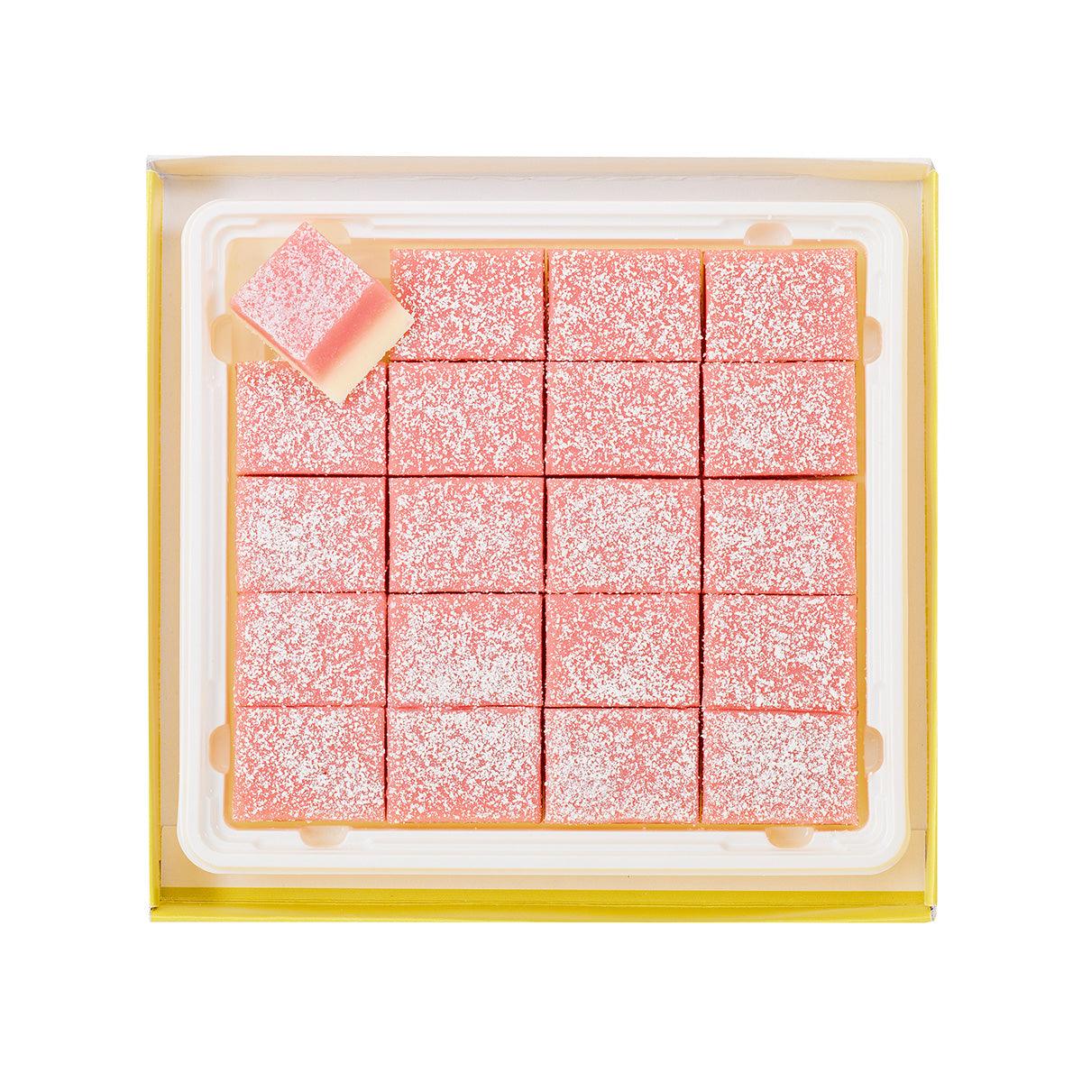 Strawberry milk nama chocolate tray with pink strawberry-flavored square pieces