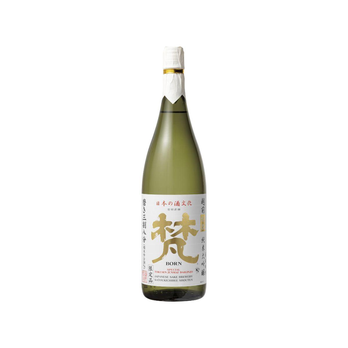 BORN Japanese sake bottle with pale gold liquid and front label