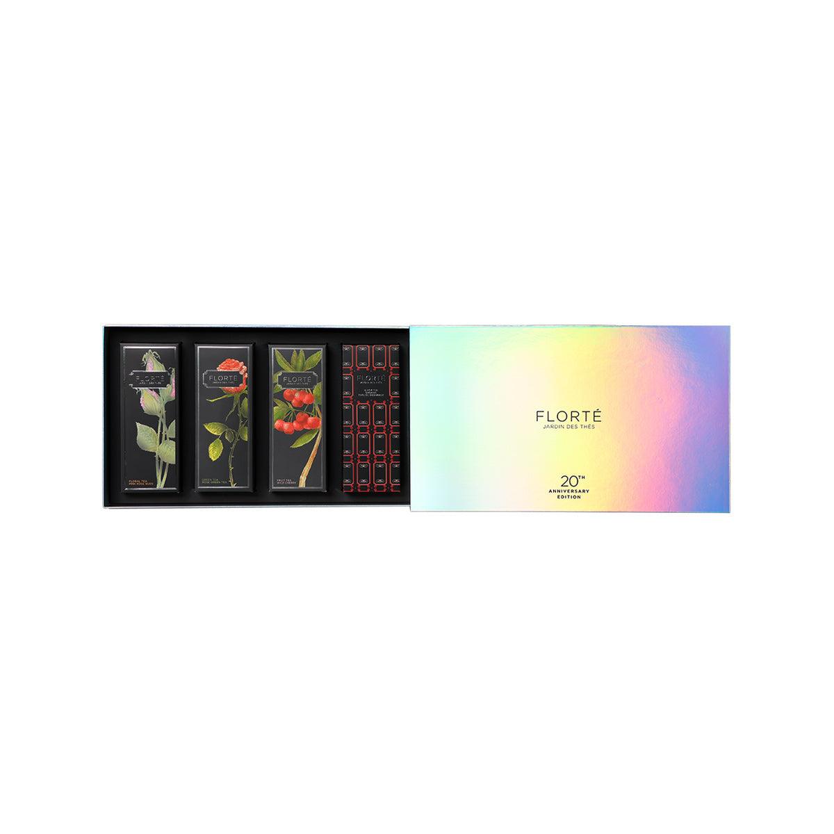 FLORTE tea gift set with four assorted tea boxes and iridescent outer sleeve