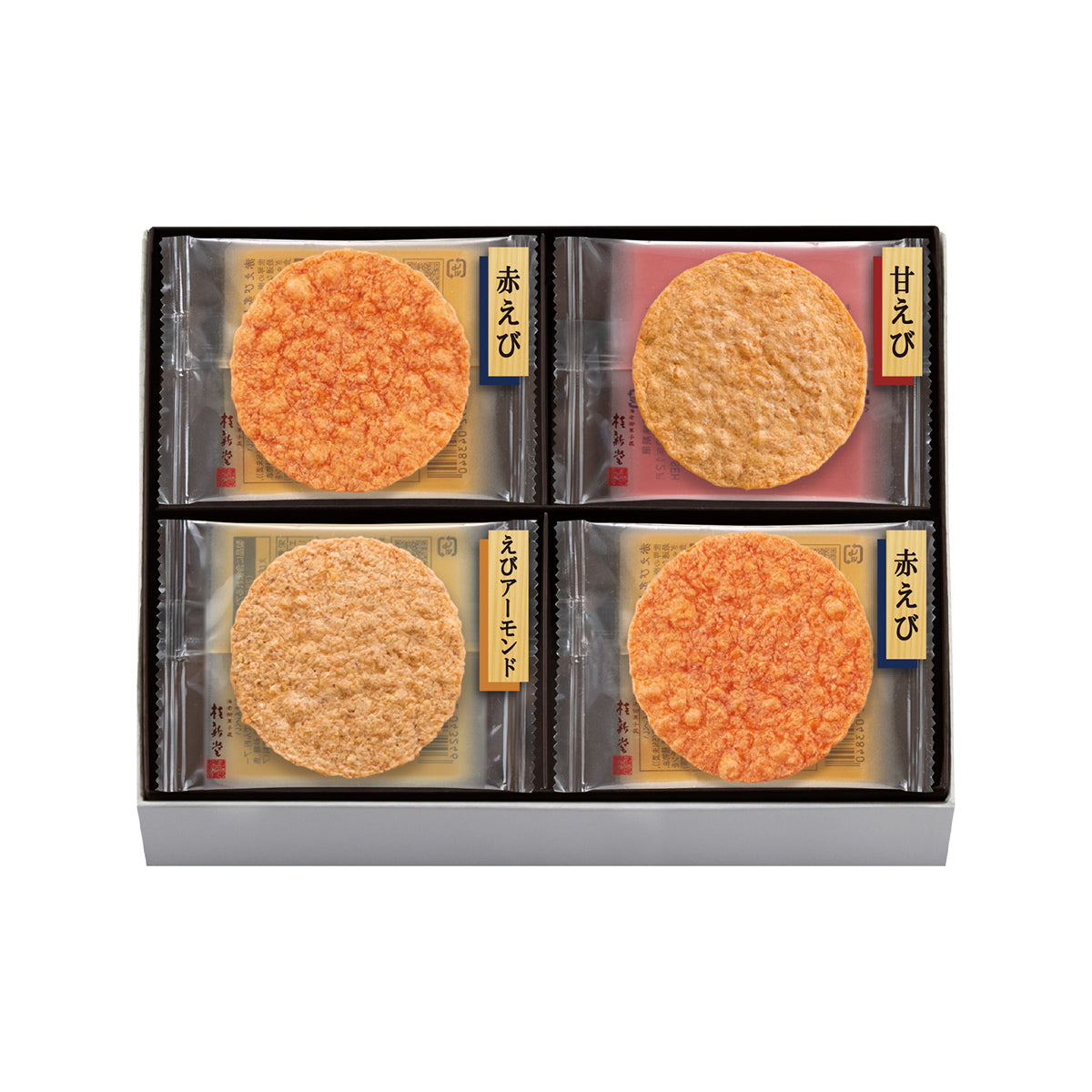 Shrimp cracker assortment box with four round roasted crackers