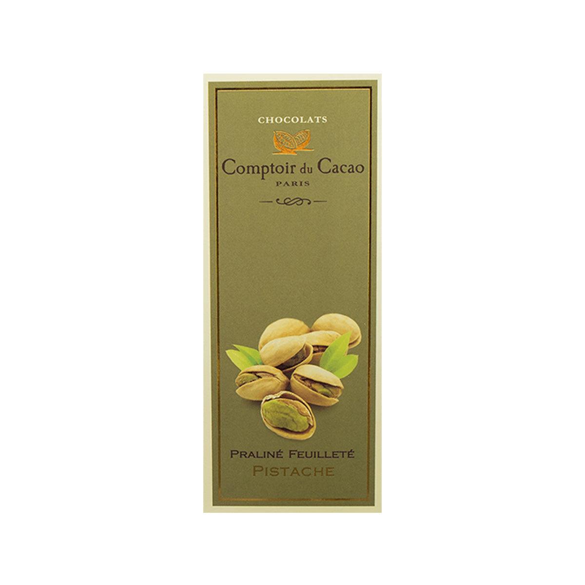 Pistachio praline chocolate bar in green-gold wrapper with pistachio illustration