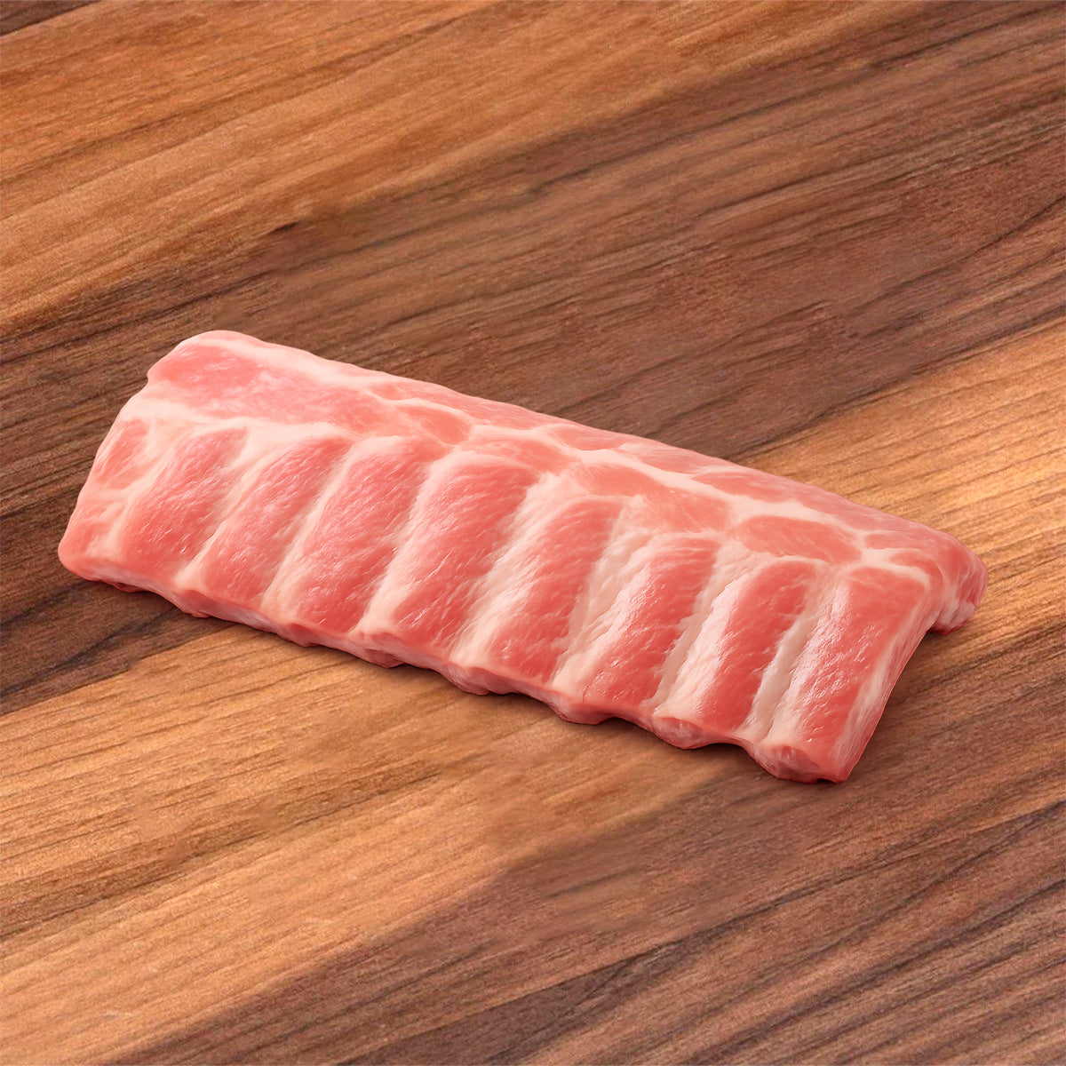 Frozen pork baby back ribs rack, pink meat with visible bone lines