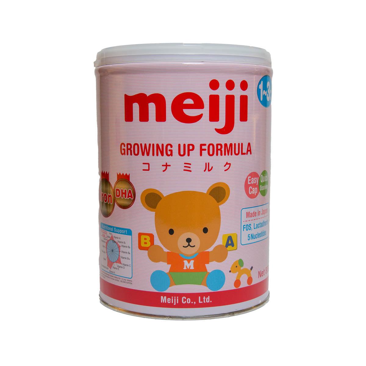 MEIJI Growing Up Formula can with bear graphic and DHA text