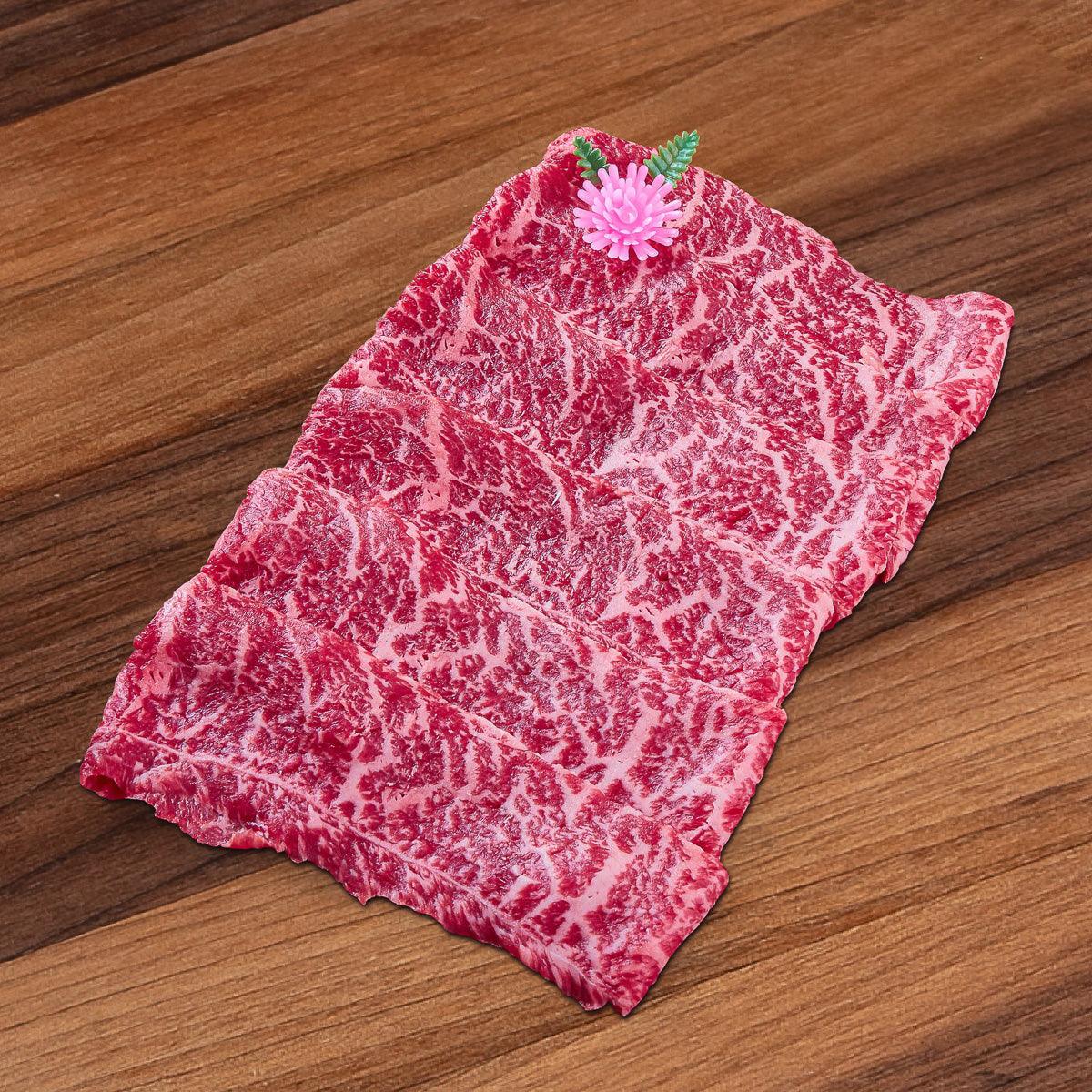 Chilled top sirloin cap steak with red and white marbling
